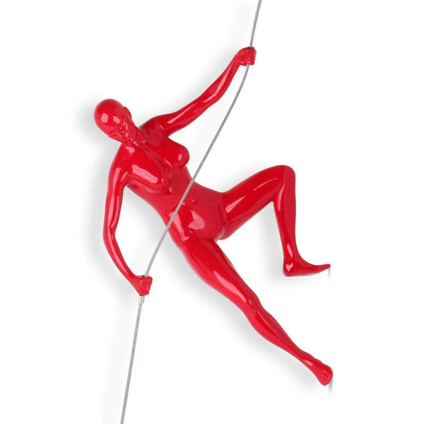 Bergsteigerin 3 rot. Moderne figurative Skulptur aus lackiertem Harz, zum Aufhängen an der Wand - Designerobjekte.com