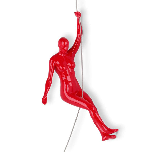 Bergsteigerin 4. Rot. Moderne figurative Skulptur aus lackiertem Harz, zum Aufhängen an der Wand - Designerobjekte.com