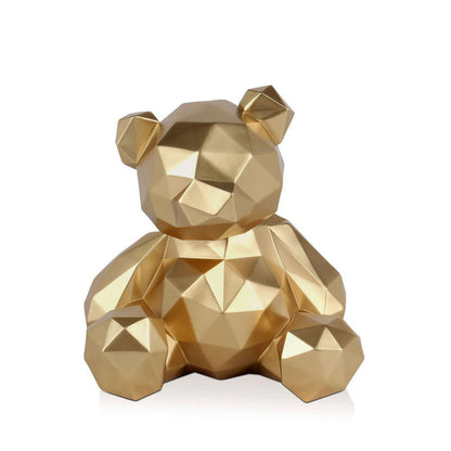 Facettierte Bärchen-Skulptur aus hochwertigem Harz mit Metalleffekt, in goldener Farbe, zeigt kreative geometrische Formen und eine glänzende Oberfläche.