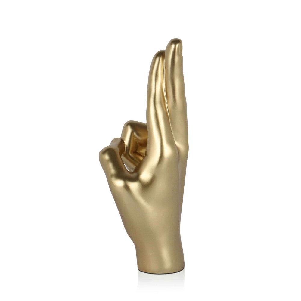 Gekreuzte Finger Skulptur in Gold - Symbol für Hoffnung und Stil, elegant und modern, perfektes Dekorationselement.