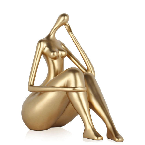 Kleine Reflexion, gold. Moderne figurative Skulptur aus Kunstharz, Metalleffekt. 26,5 x 27 x 13 cm - Designerobjekte.com