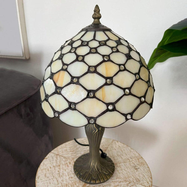 Nachttischlampe mit Edelsteinen. Mit Lampenschirm aus geschweißtem Glas in Tiffany-Verarbeitung und Ständer aus bronziertem Metall - Designerobjekte.com