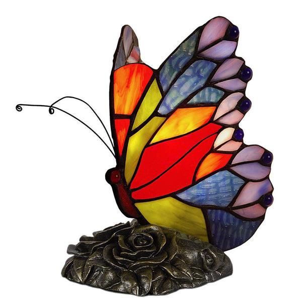 Nachttischlampe Tiffany - Stil Schmetterling. Mit geschweißtem Glasschirm, Tiffany-Verarbeitung und mit bronziertem Harzfuß - Designerobjekte.com