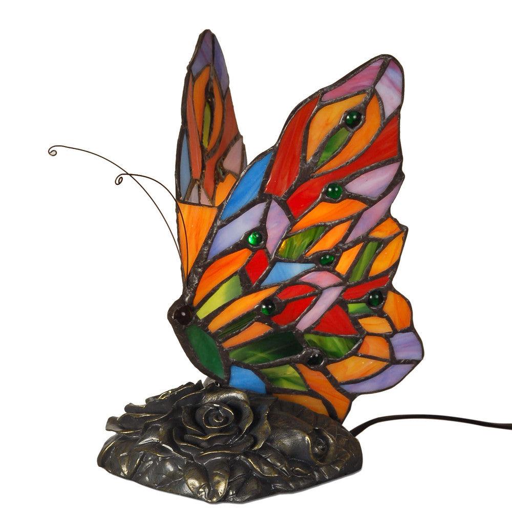 Tiffany Nachttischlampe im Schmetterlingsdesign, Rückansicht zeigt das kunstvolle Schmetterlingsmotiv aus buntem Glas und den stabilen Kunstharzfuß.