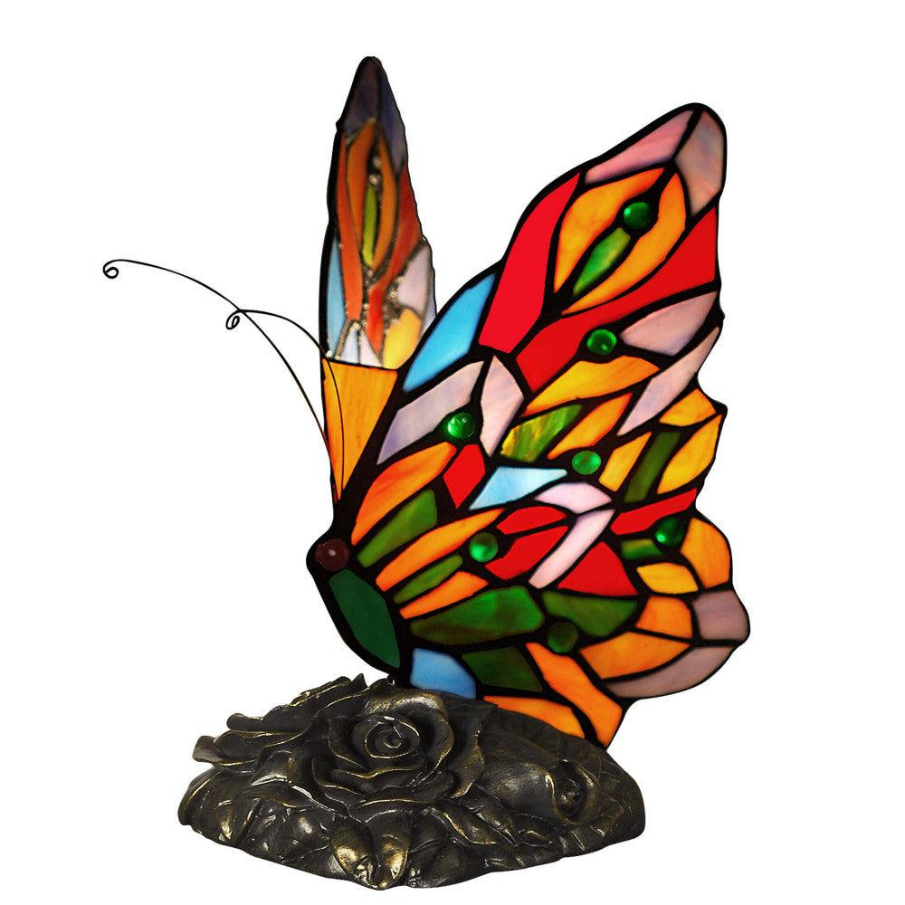 Tiffany Nachttischlampe im Schmetterlingsdesign, Ansicht von vorne mit strahlenden Farben und filigranen Details, perfekt für stimmungsvolle Beleuchtung.