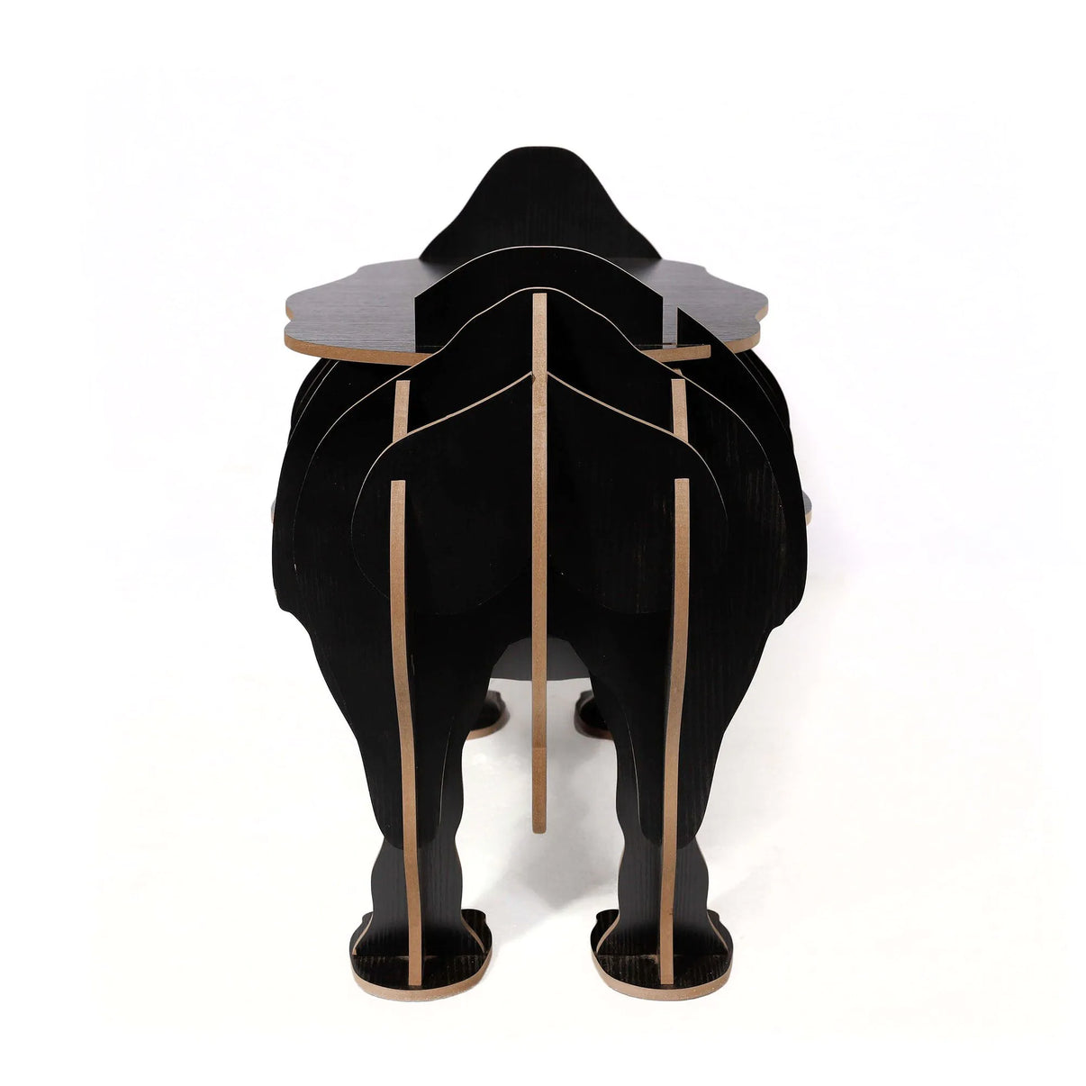 Büchertisch Schwarzes Nashorn - modernes Design mit einer Kombination aus Funktionalität und Kunst, ideal als Akzentmöbel.