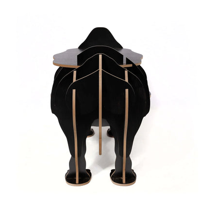 Büchertisch Schwarzes Nashorn - modernes Design mit einer Kombination aus Funktionalität und Kunst, ideal als Akzentmöbel.