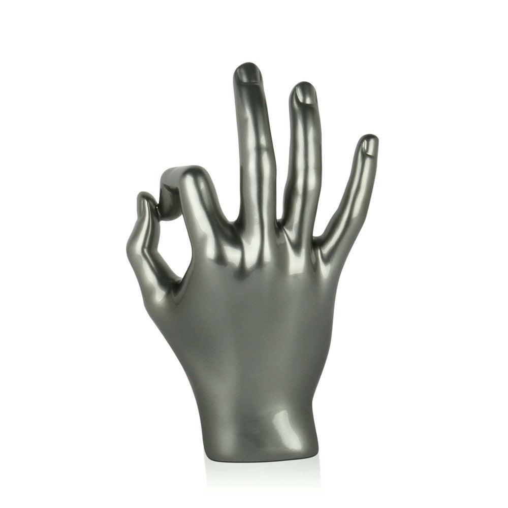 Moderne figurative Skulptur in anthrazit mit Metalleffekt – handgefertigtes Kunstwerk für stilvolle Inneneinrichtungen, das eine Hand in der Pose des ok Zeichens darstellt.