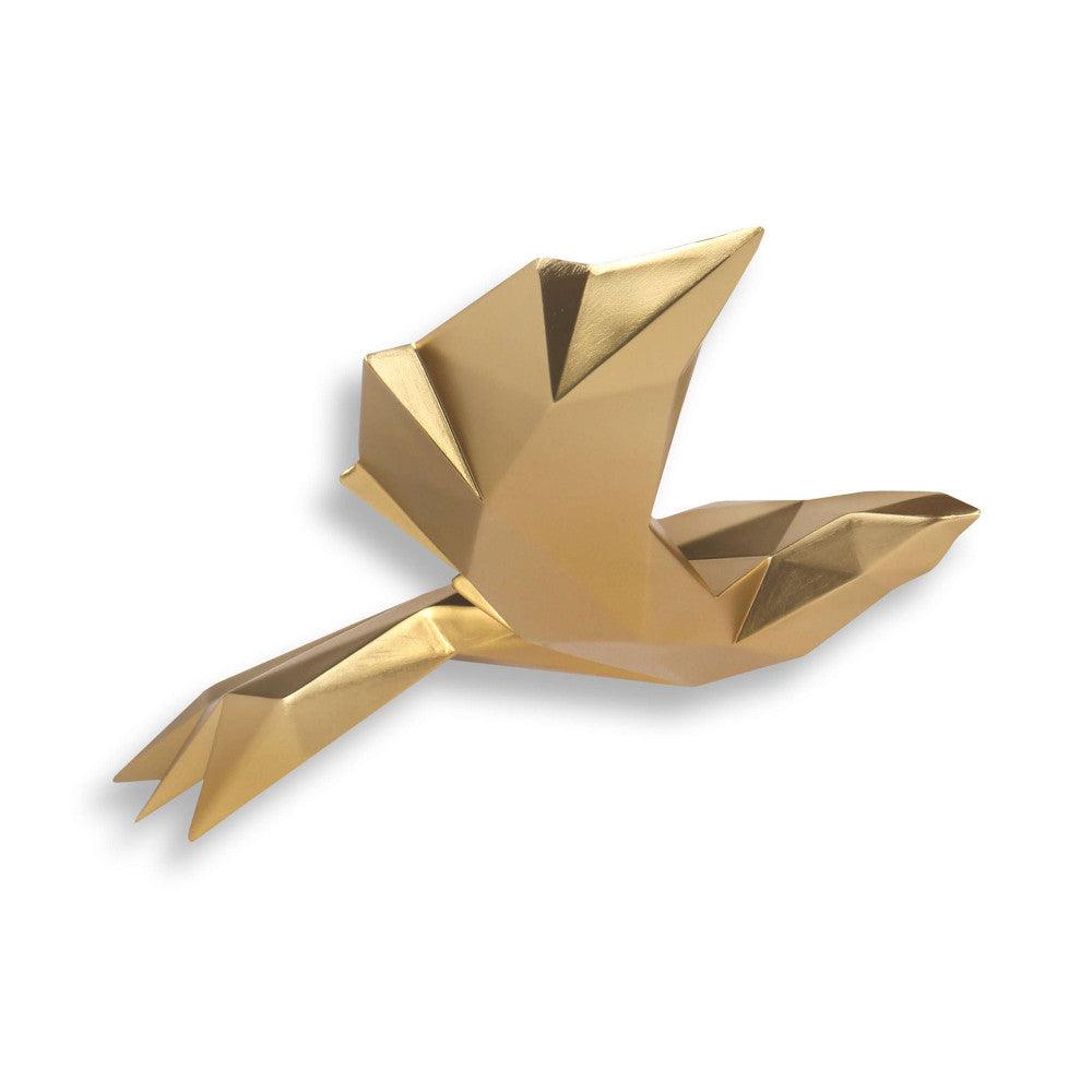 Elegante Origami-Vogel-Skulptur aus Kunstharz mit goldenem Metalleffekt, prominent dargestellt im Flug mit prägnanten geometrischen Formen.