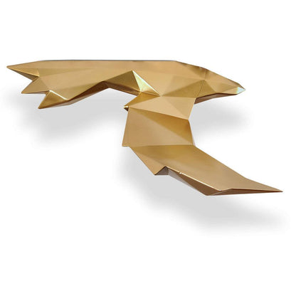 Elegante Origami-Vogel-Skulptur aus Kunstharz mit goldenem Metalleffekt, aus der Seitansicht mit klaren Linien und einer modernen Ästhetik.