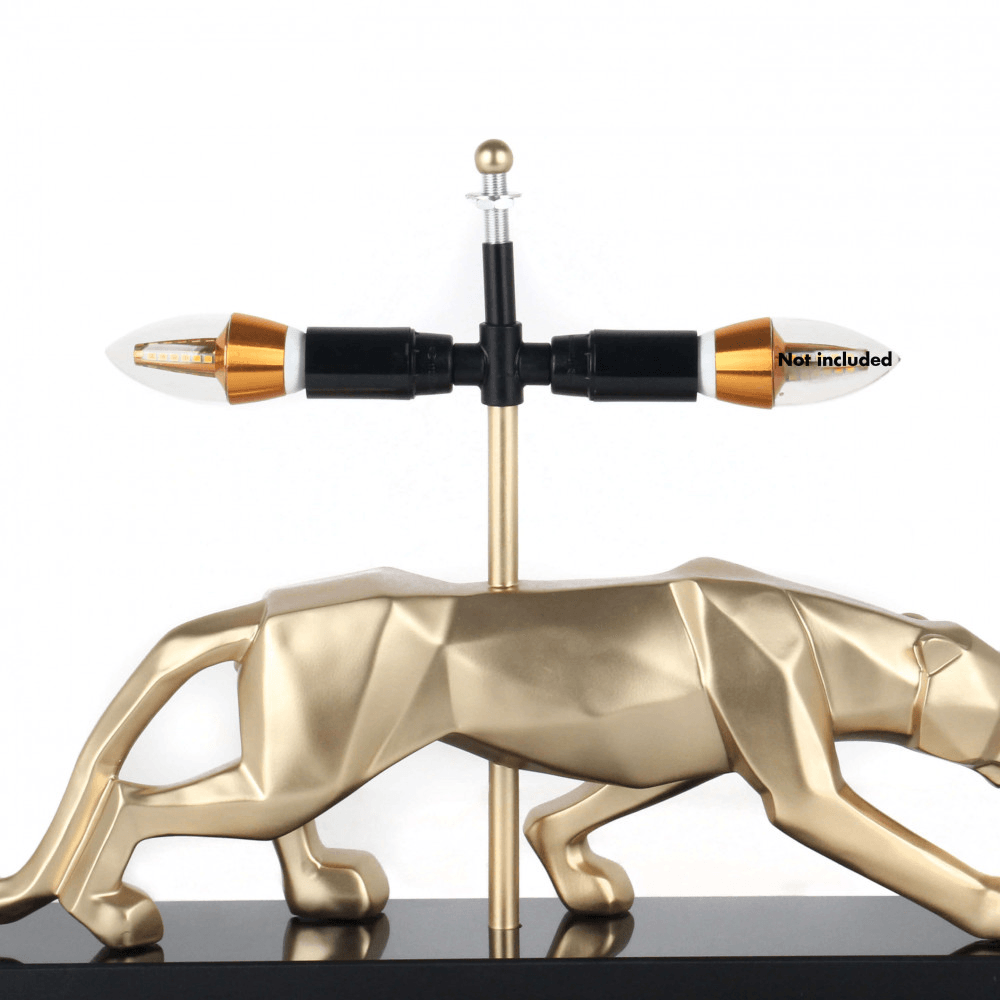Panther Tischlampe – Moderne Skulptur aus Harz mit Marmorsockel und Metalleffekt, Detailansicht der Lampe ohne Glühbirnen, zeigt das kunstvolle Panther-Design und die goldene Oberflächenstruktur.