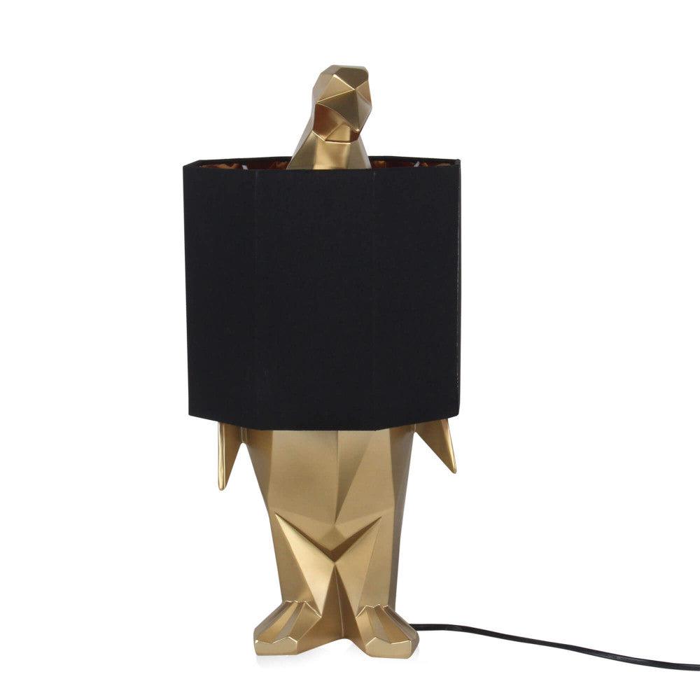 Pinguin Gold Tischlampe – Elegante Harzskulptur mit Metalleffekt in goldener Farbe mit schwarzem Lampenschirm, perfekt für stilvolle Akzente in Wohnräumen.