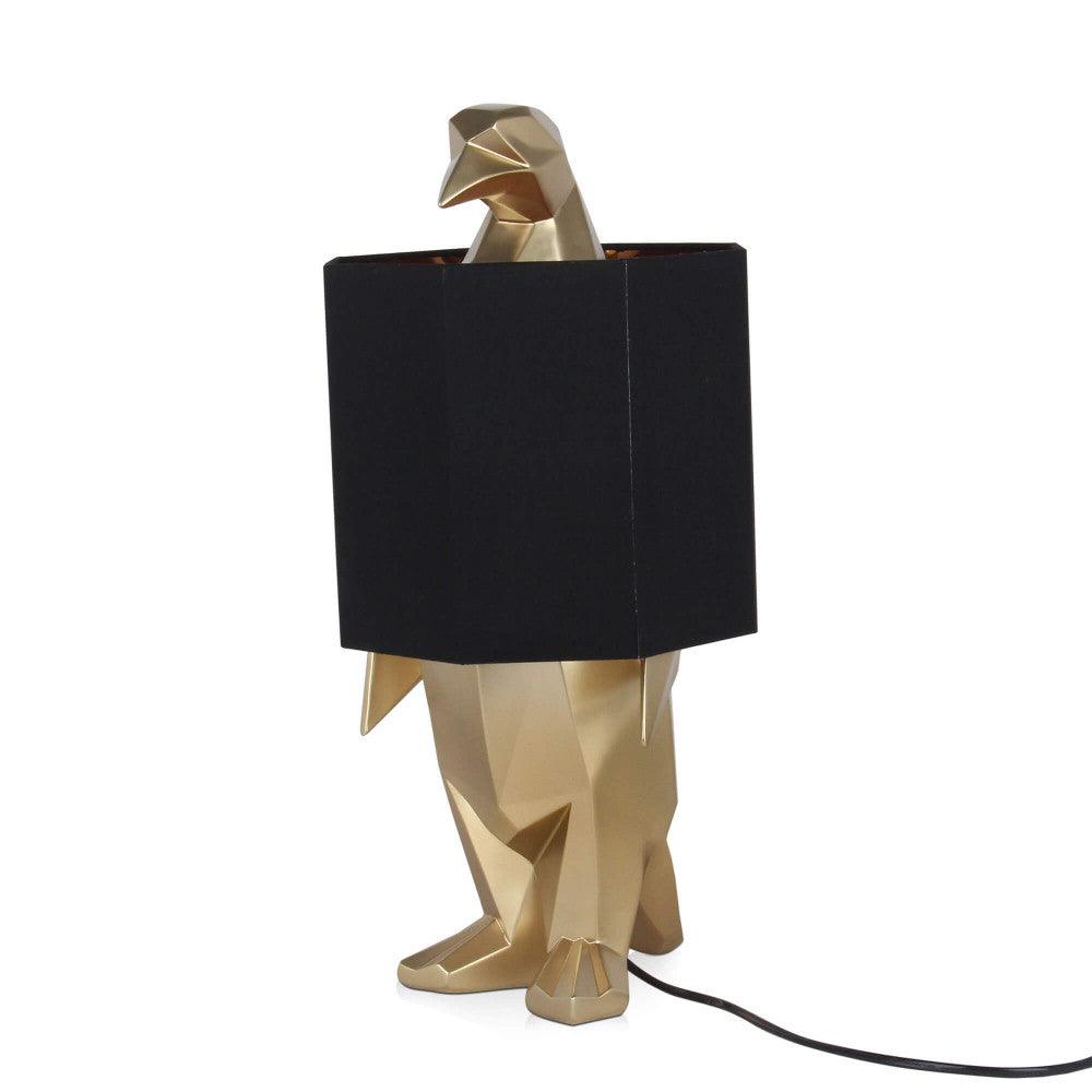 Seitenansicht der Pinguin Gold Tischlampe – elegante Harzskulptur mit Metalleffekt, die ein modernes Design und funktionale Beleuchtung kombiniert.