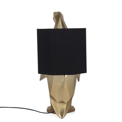 Pinguin Gold Tischlampe – elegante Harzskulptur mit schickem schwarzen Lampenschirm, modernes Design für stilvolle Akzente im Raum.