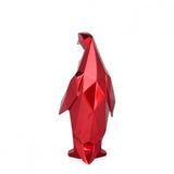 Pinguin rot. Facettierte moderne Skulptur aus Harz, Metalleffekt - Designerobjekte.com