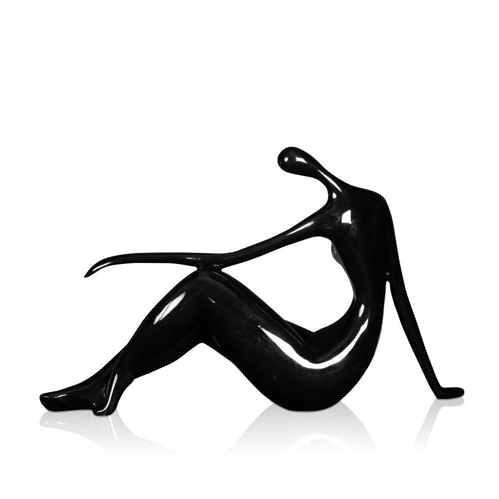 Ruhende Dame – elegante figurative Skulptur in Schwarz aus lackiertem Kunstharz, mit geschwungenen Linien und stilisierte weiblichen Figur, perfekt für jedes Wohnambiente.