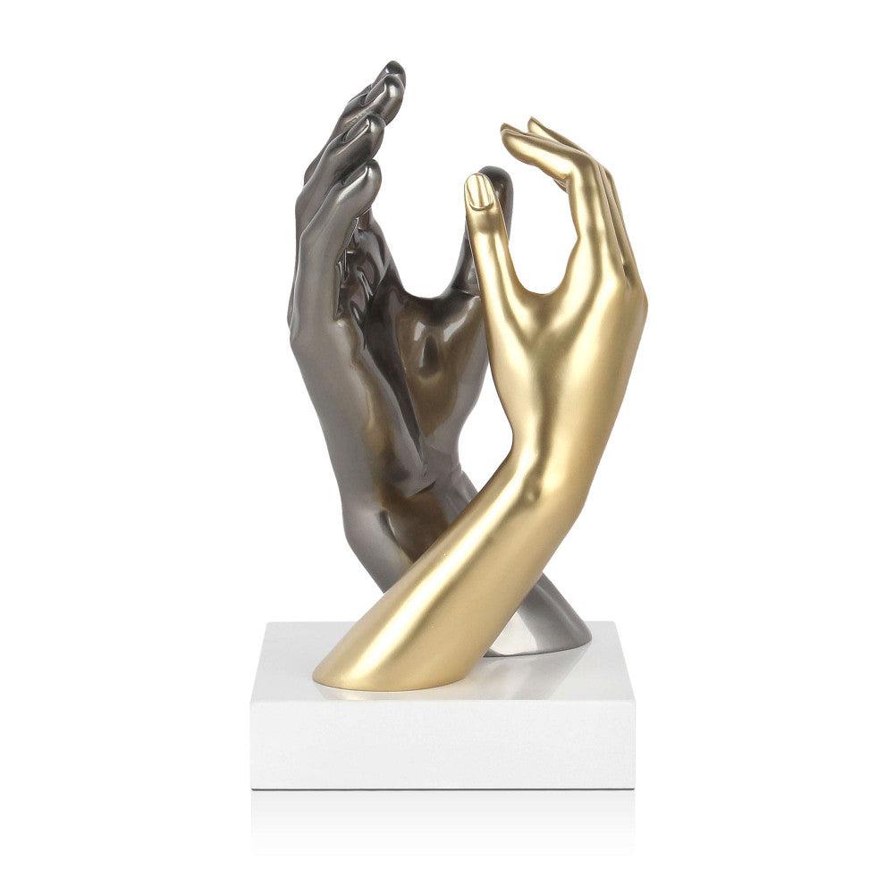 Moderne figurative Skulptur "Tiefe Vereinigung" mit goldenen und silbernen Händen, die sich in einem eleganten Design berühren, präsentiert auf einem Marmorsockel.