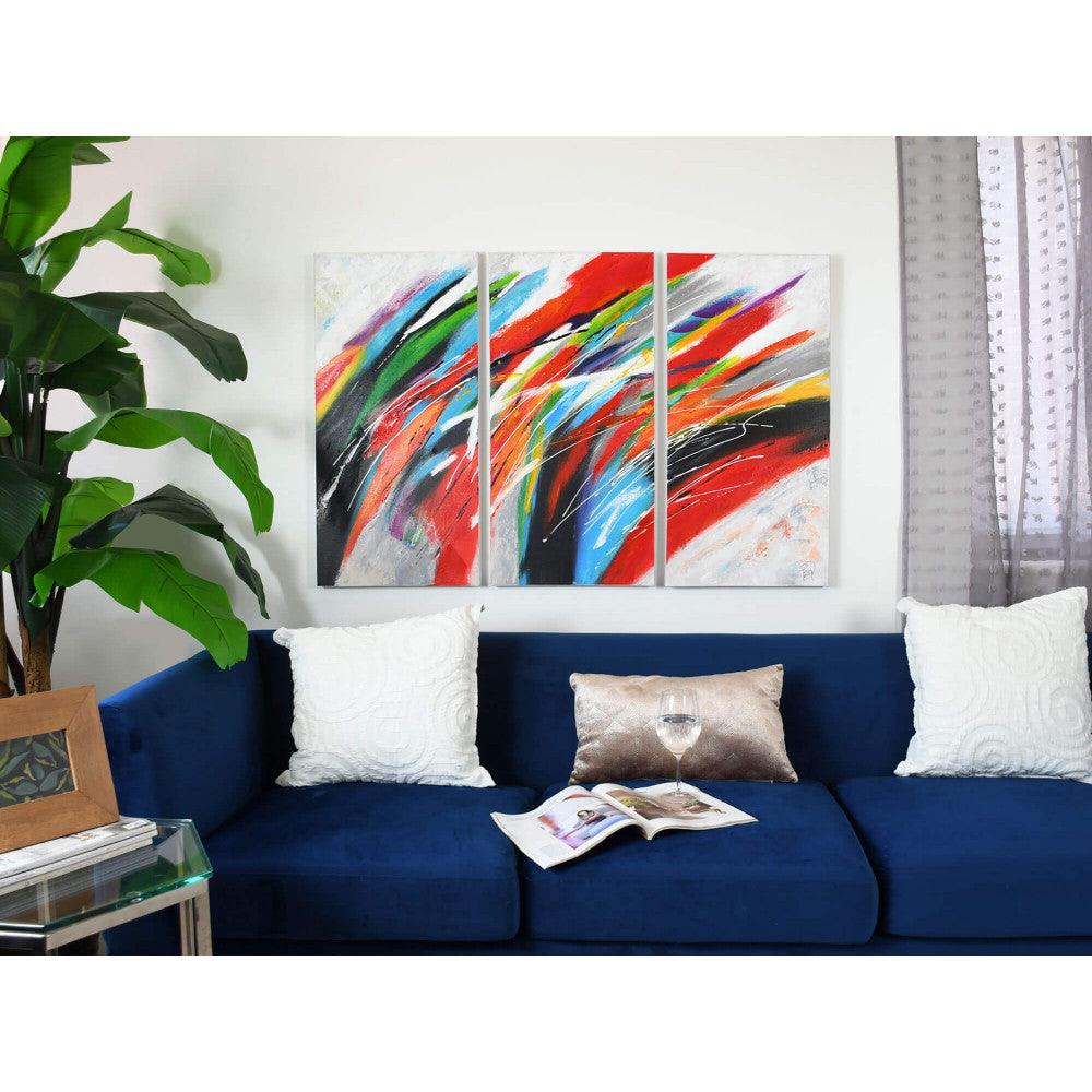 Faszinierendes mehrfarbiges Wellen-Gemälde auf Leinwand - Handgemalt, 80 x 120 cm. Das Gemälde präsentiert sich eindrucksvoll über einem blauen Sofa in einem modernen Wohnraum.