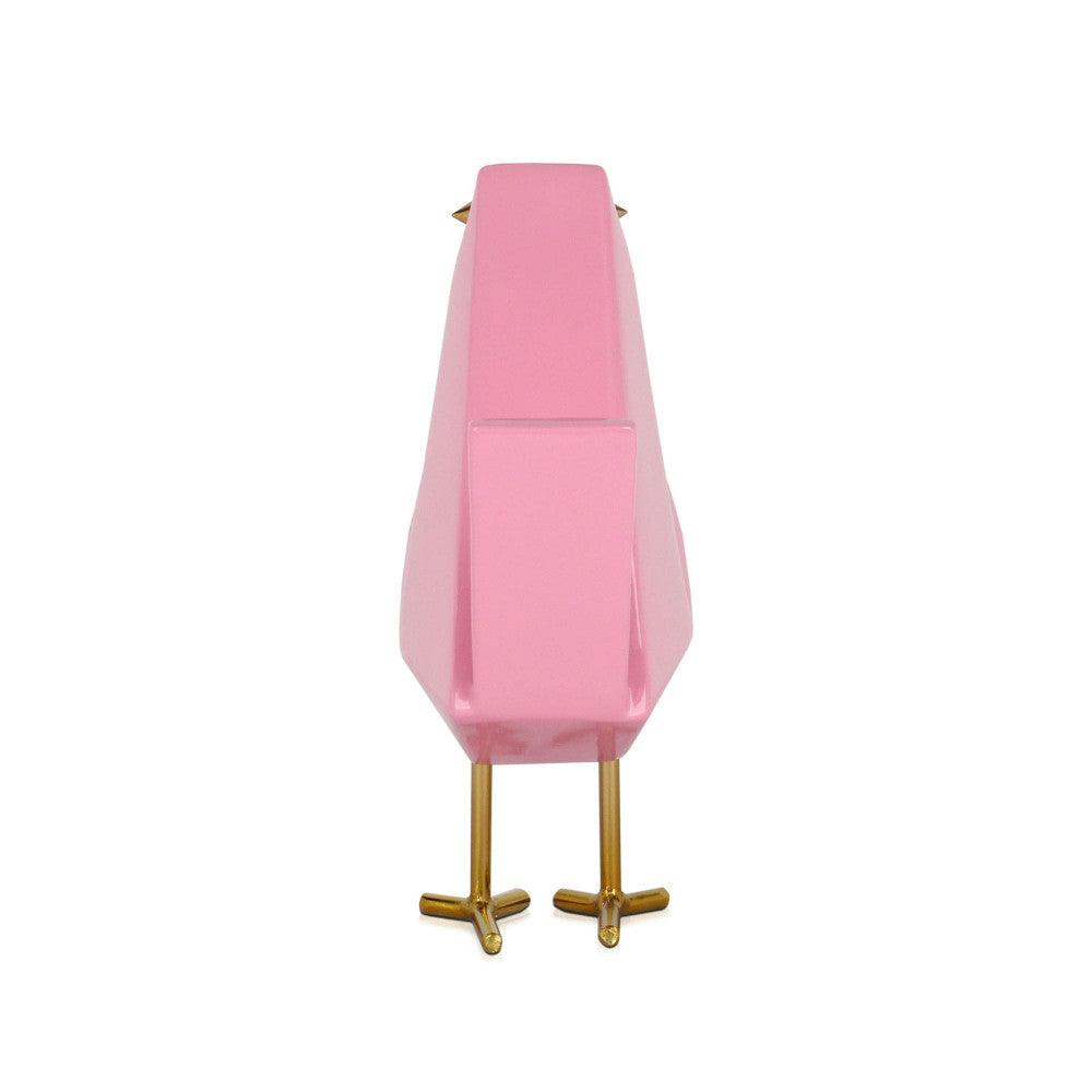 Vöglein rosa – Moderne geometrische Skulptur aus lackiertem Harz mit eleganten Metalleinsätzen, Seitenansicht der pinken Skulptur mit klaren geometrischen Linien.